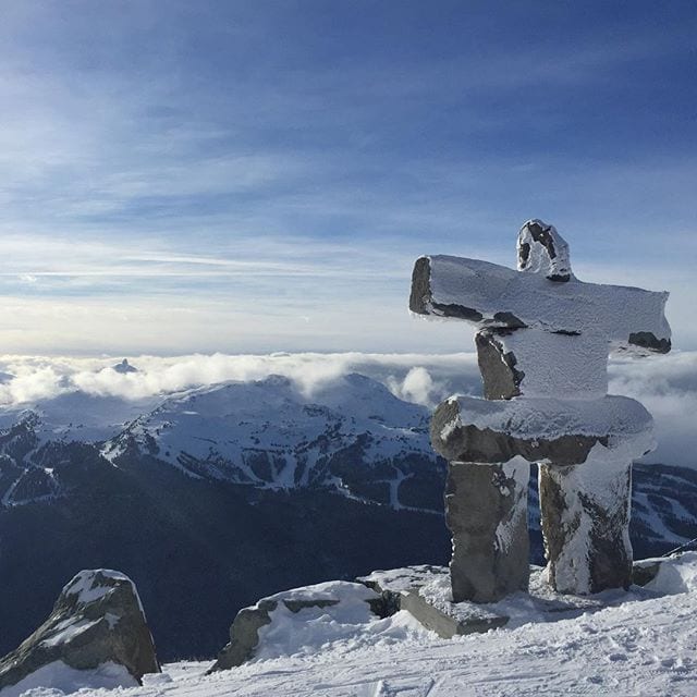 Inukshuk watches over Black Tusk sitting in Clouds