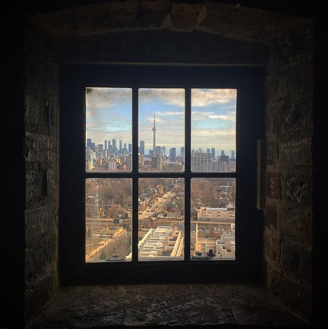 Toronto’s CN Tower viewed from the Scottish Tower of Casa Loma