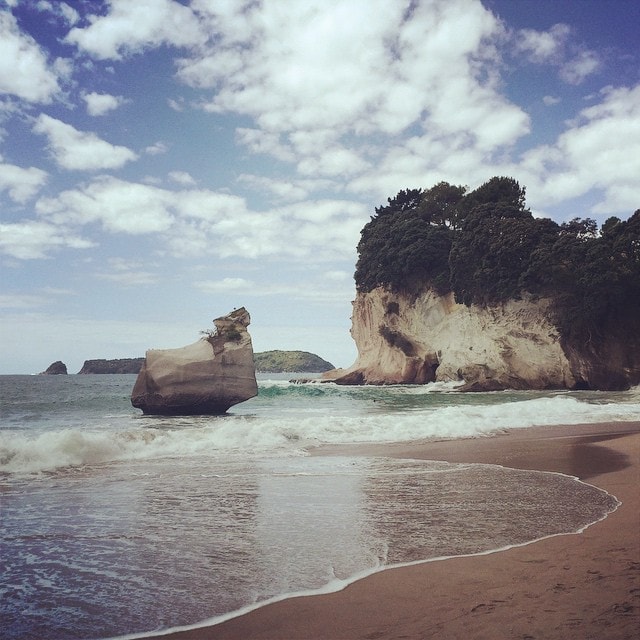 #Waves roll onto the #beach at #CathedralCove #NewZealand